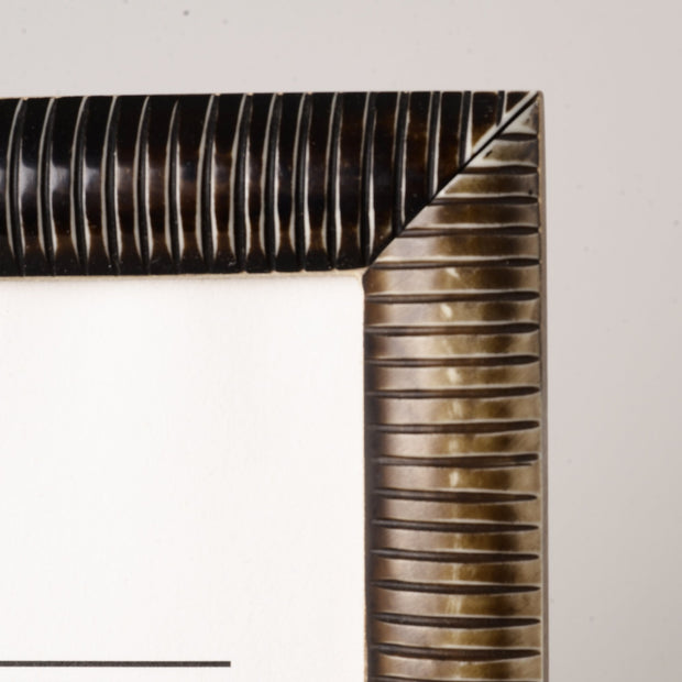 Brown ribbed resin frame